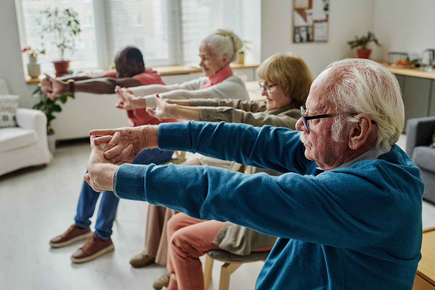 Group of older adults practicing mobility exercises